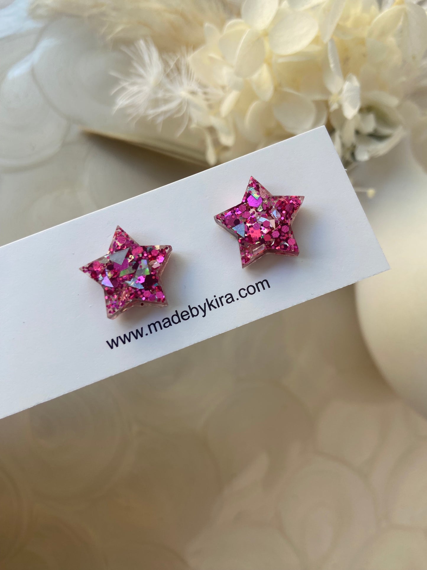 Pink star studs